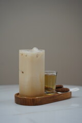 Cup of Milk with Shot of Coffee and Cookie