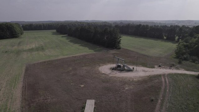 Oil Derrick in a Field