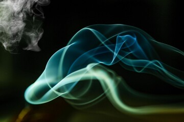 smoke on black and dark background Gives a calm, cool, smart mood