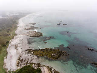 Exploring the beach in the mist morning at Kejimkujik National Park Seaside, Nova Scotia, Canada