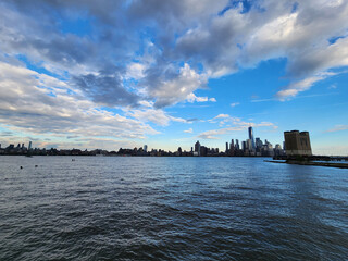 Naklejka premium new york city. skyscraper building of nyc. ny urban city architecture. midtown manhattan and hudson river. metropolis cityscape. new york downtown. manhattan skyline. Over the East River