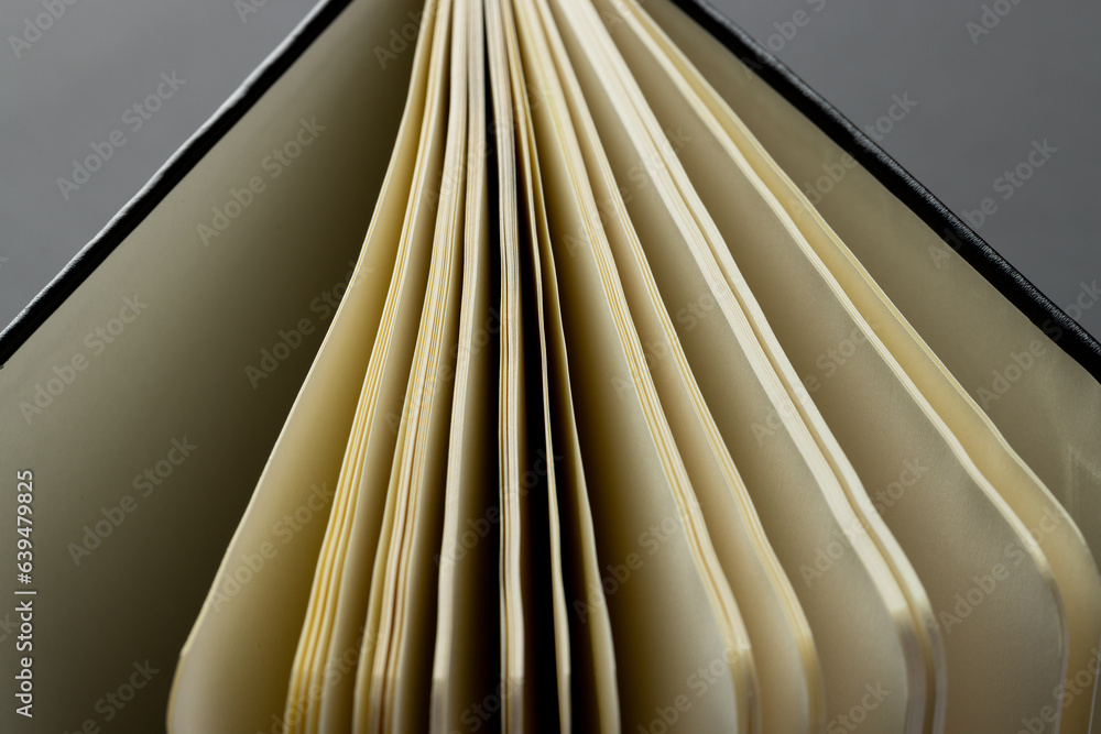 Aufkleber micro of notebook pages and copy space on grey background