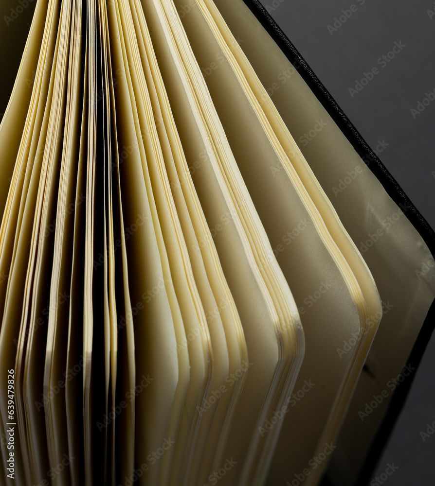 Aufkleber micro of notebook pages and copy space on grey background