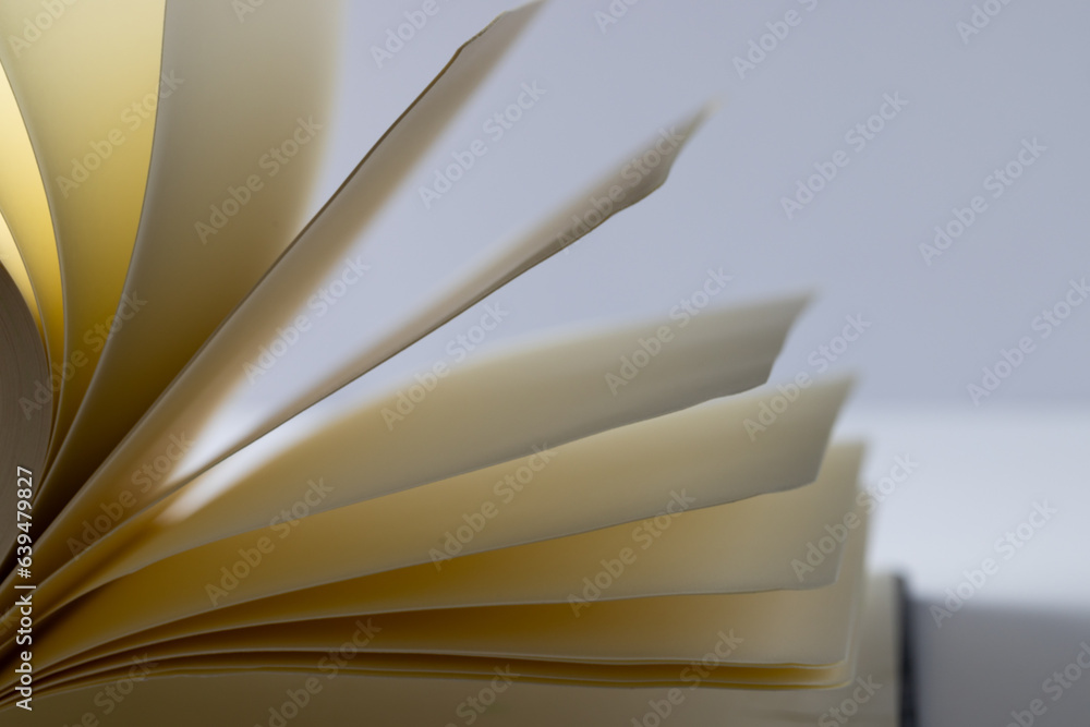 Aufkleber micro of notebook pages and copy space on grey background