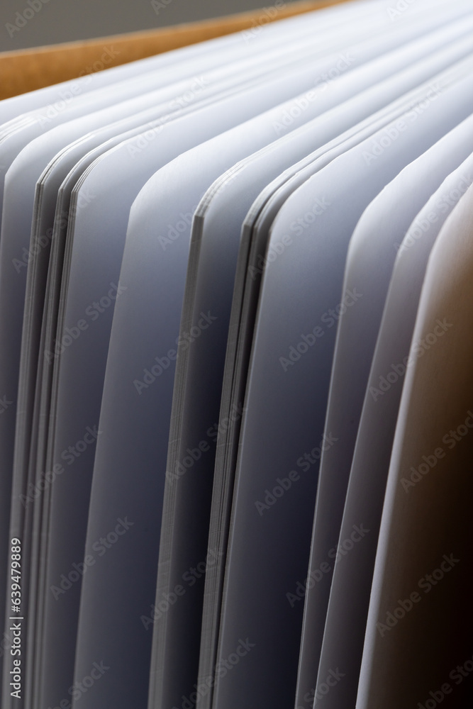 Aufkleber micro of notebook pages and copy space on grey background