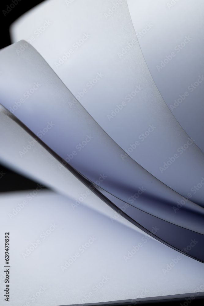 Aufkleber micro of notebook pages and copy space on black background