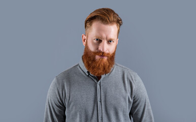 Obraz premium studio shot of unshaven man. beard care and barbering. handsome unshaven man has beard. unshaven man