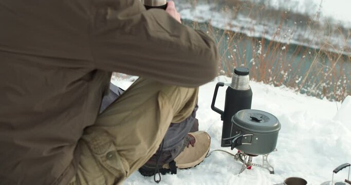 stop the time and enjoy every moment, Back rare view, set of equipment for traveler and hicker on snow Slow motion. surviving in harsh cold conditions. Have a good time outdoor