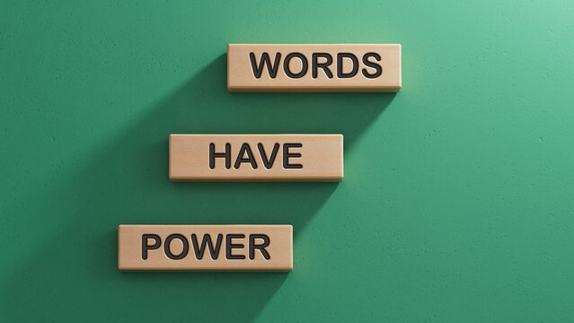 Words have power symbol. Wooden blocks with words Words have power.  Business and Words have power concept. Copy space.3D rendering on green background.
