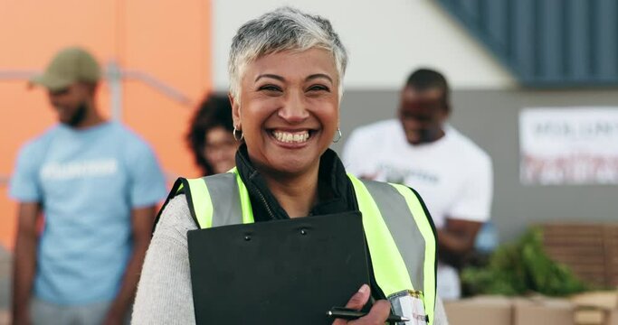 Happy senior woman, management and NGO in charity, volunteer or team in community service. Portrait of mature female person or organizer smile in happiness for leadership, donations or contribution