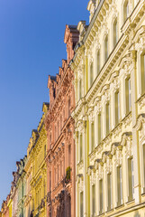 Colorful decorated facades of historic houses in Karlovy Vary
