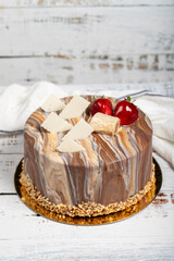 Birthday cake. Fresh delicious chocolate and fruit cake on a white background