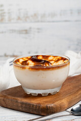 Rice pudding. Fresh delicious rice pudding on a white background. Mild dessert with milk and rice. Traditional Turkish cuisine delicacies. Local name sutlac