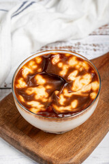 Rice pudding. Fresh delicious rice pudding on a white background. Mild dessert with milk and rice. Traditional Turkish cuisine delicacies. Local name sutlac