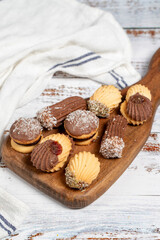 Types of cookies. Assortment of fresh delicious patisserie cookies on a white background
