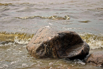 Stone in water