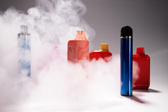 Set of disposable vape for smoking in cigarette smoke, multicolored electronic cigarettes, ecigarettes