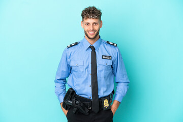Young police blonde man isolated white on blue background laughing