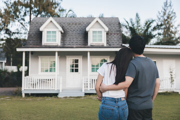 Asian love couple standing outside the new tiny house in countryside - 639503444