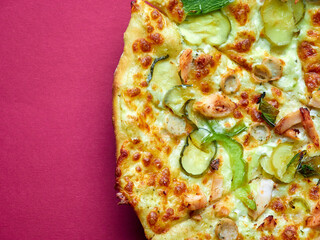 Pizza with chicken, cheese and herbs close-up. spicy pizza