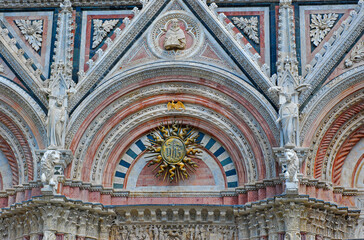 Detail of the magnificently decorated Duomo of Siena. Tuscany Italy - obrazy, fototapety, plakaty