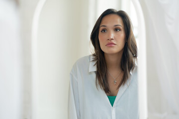 woman clean fresh healthy white skin looking at mirror.spa and beauty concept