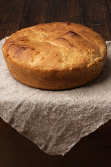 loaf of bread on wooden table