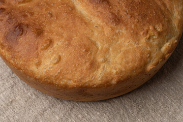 loaf of bread on wooden table