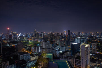 Naklejka premium Night cityscape and high-rise buildings in Bangkok