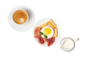 a cup of coffee, scrambled eggs with bacon and a milk jug on an isolated background
