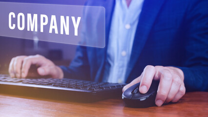 Businessman pressing button company on virtual screens, business, technology, internet and networking concept.