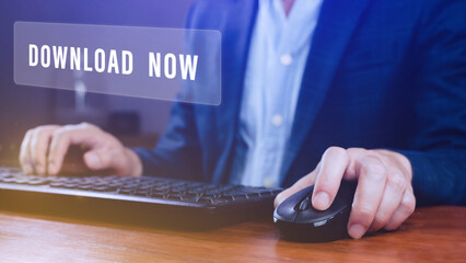 Businessman pressing button download now on virtual screens, business, technology, internet and networking concept.