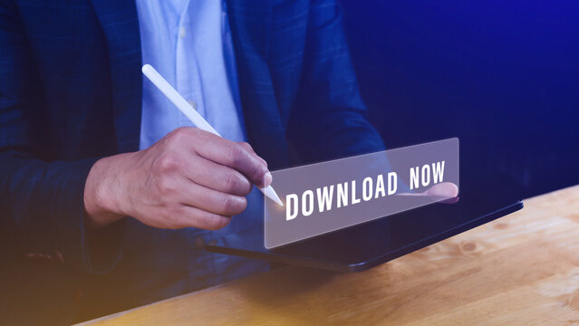 Businessman pressing button download now on virtual screens, business, technology, internet and networking concept.