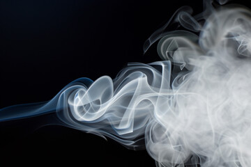 Beautiful white smoke with natural pattern on black background with charming pattern