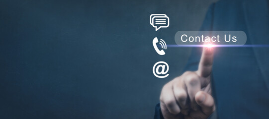 Fototapeta premium Contact us. Customer service call center contact us concept. contact us or customer support hotline. finger touch to access contact icons email, phone, live chat on virtual screen. Banner