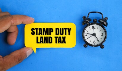 bell clock and conversation bubble with the word Stamp Duty Land Tax or the letters SDLT