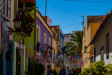 Fototapeta na wymiar nnarrow streets of the old town in Calpe Spain on a summer hot holiday day