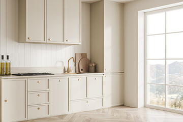 Beige kitchen interior with shelves, kitchenware and panoramic window
