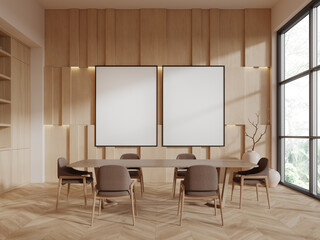 White and wooden dining room with posters