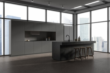Stylish grey home kitchen interior with bar island and eating space, window