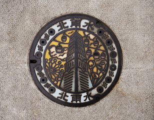Taiwan, Taipei - Sunday, 23 February 2020 : Manhole Cover near TAIPEI 101 Observatory which been used for a long time.