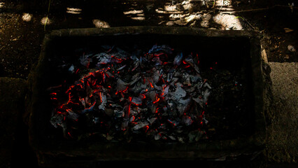 burning coconut shell coals as background