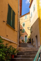 Fototapeta na wymiar Steps and narrow street in Villefranche sur Mer