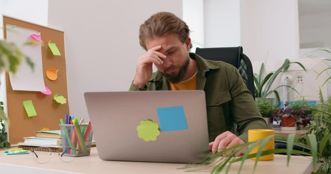 Disappointed depressed sad businessman freelancer caucasian man has problem in business.Guy make mistake error send incorrect data read bad e-mail message news upset male fail business deal bankruptcy