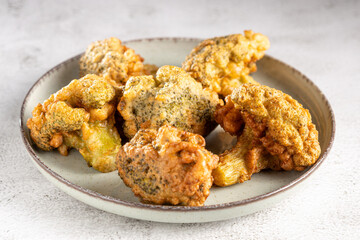 Fried breaded broccoli on the table.