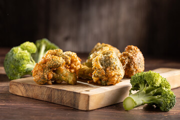 Fried breaded broccoli on the table.