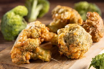Fried breaded broccoli on the table.
