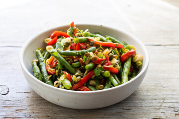 Green beans salad with red peppers, capers and spring onions
