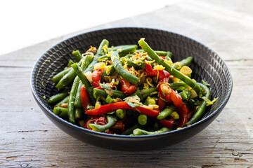 Green beans salad with red peppers, capers and spring onions
