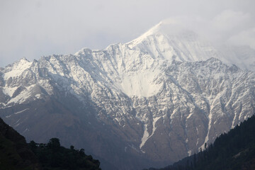 Beautiful mountain landscape of himalaya, India High Altitude mountain pass, snow mountains in the background, selective focus with blur 
